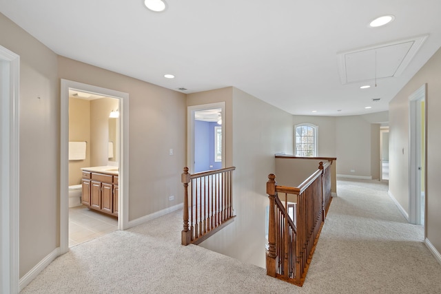 hallway with light carpet