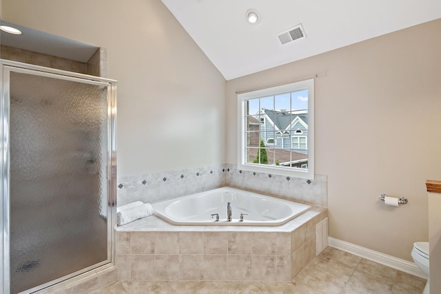 bathroom featuring tile patterned flooring, toilet, independent shower and bath, and vaulted ceiling