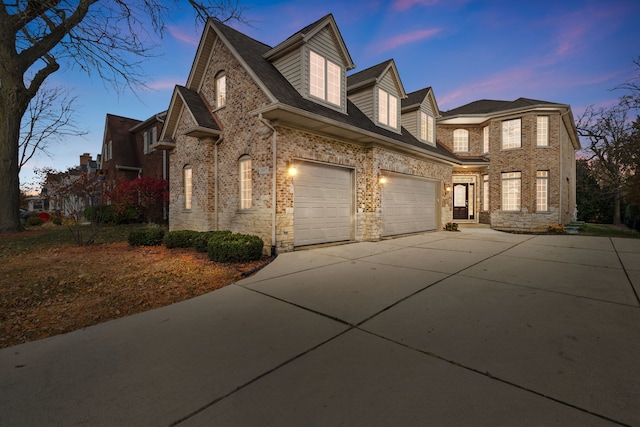 view of front of property with a garage