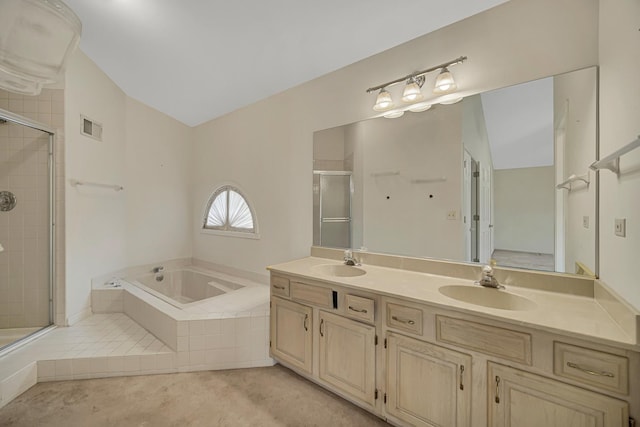 bathroom with vanity and independent shower and bath