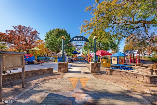 view of home's community featuring a playground