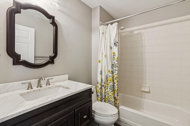 full bathroom with shower / bath combo, vanity, and toilet