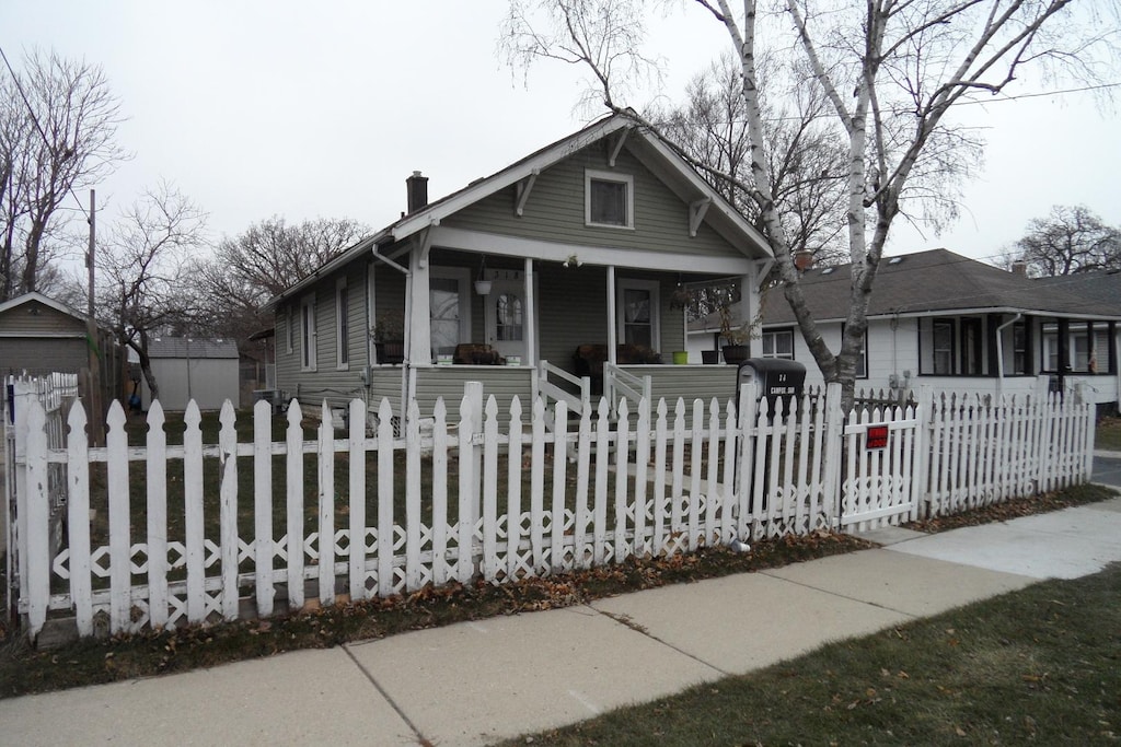 bungalow-style home with a porch