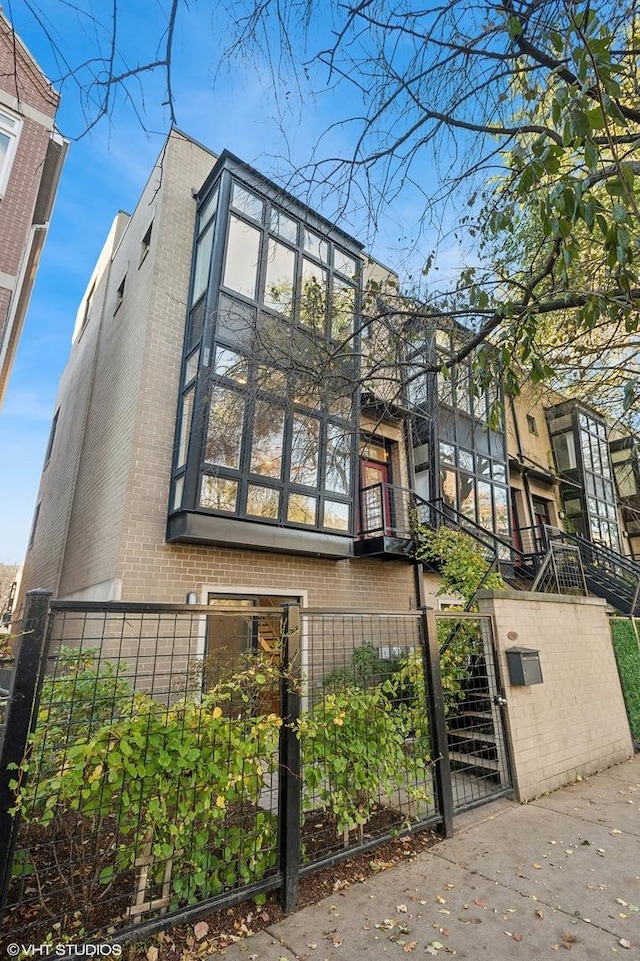 view of property exterior with a balcony