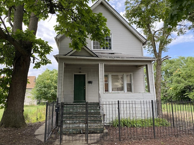 view of front of property featuring covered porch