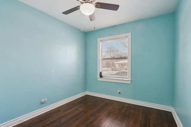 empty room with ceiling fan and hardwood / wood-style floors