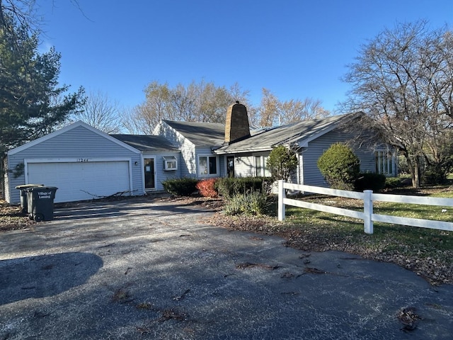 ranch-style home with a garage