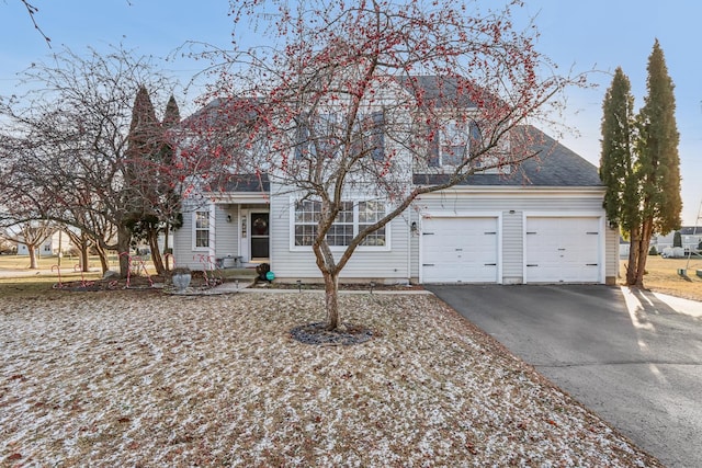 view of front of property featuring a garage