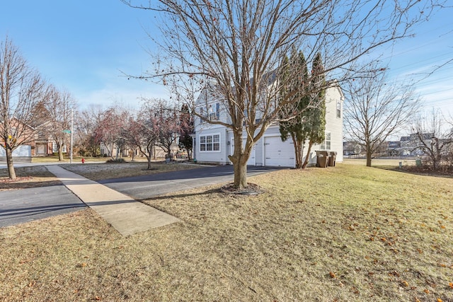 view of yard with a garage