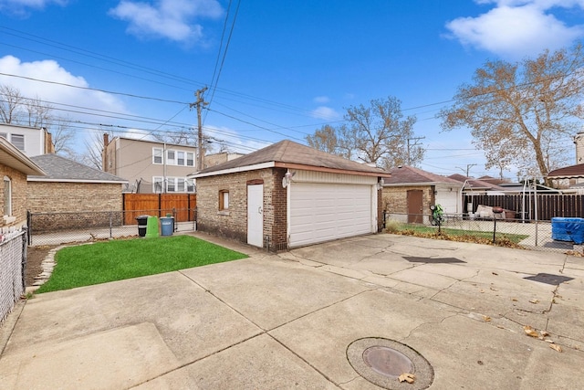 garage featuring a lawn