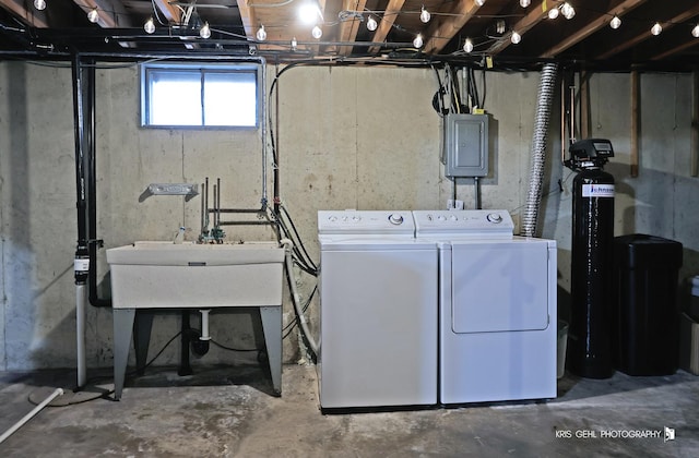 laundry area with washer and dryer and electric panel