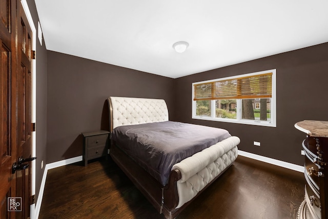 bedroom featuring dark hardwood / wood-style floors