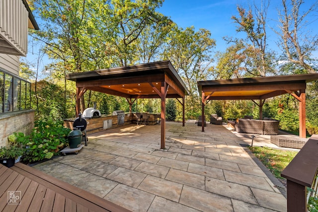 view of patio / terrace featuring a gazebo, a grill, area for grilling, and outdoor lounge area