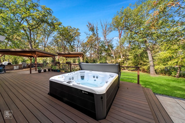 wooden terrace featuring a yard