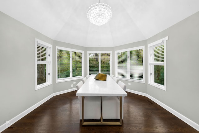 unfurnished sunroom with vaulted ceiling and a chandelier