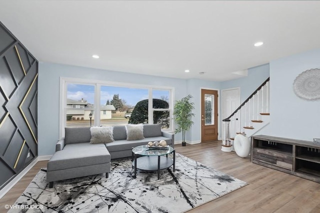 living room with light hardwood / wood-style floors