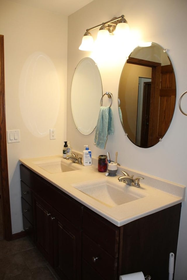 bathroom featuring tile patterned floors and vanity