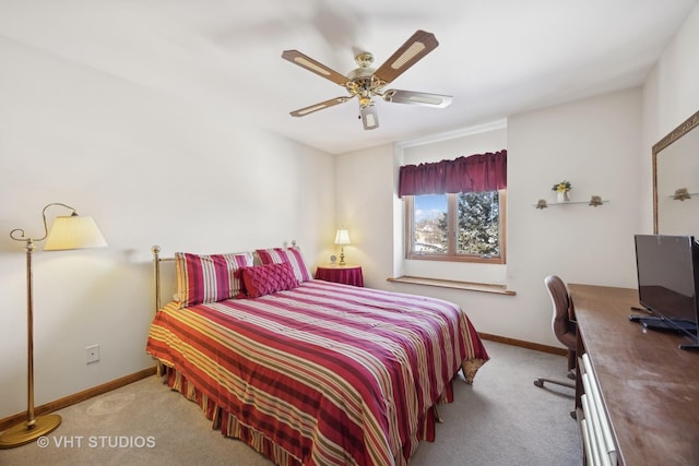 bedroom with light carpet and ceiling fan