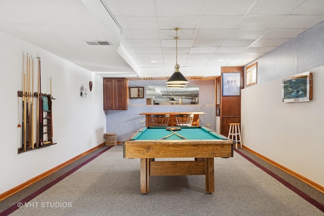 rec room featuring a paneled ceiling, bar, billiards, and light carpet