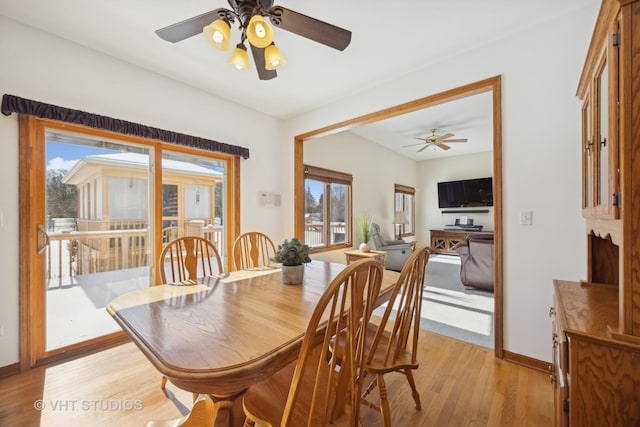 dining space featuring light wood-type flooring