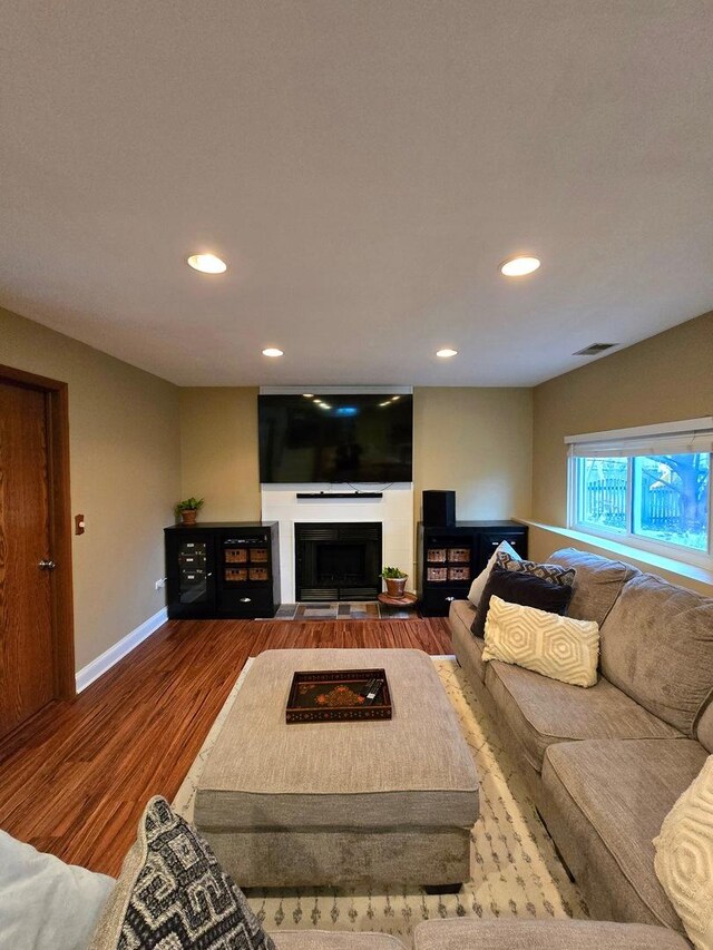 kitchen with dishwasher, dark wood-type flooring, decorative light fixtures, and an inviting chandelier