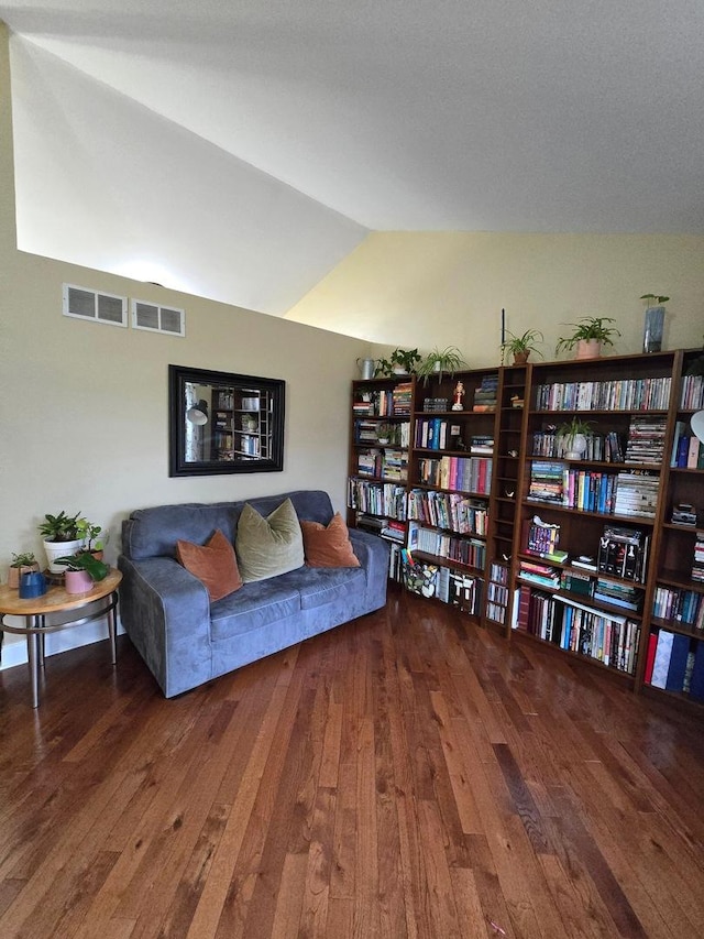 doorway to outside with french doors, hardwood / wood-style flooring, and high vaulted ceiling