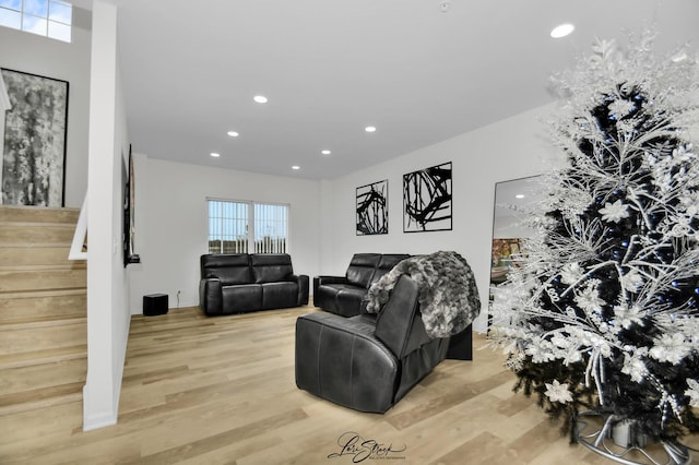 living room with light hardwood / wood-style floors