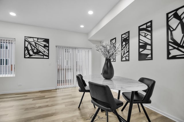 dining room featuring light hardwood / wood-style flooring