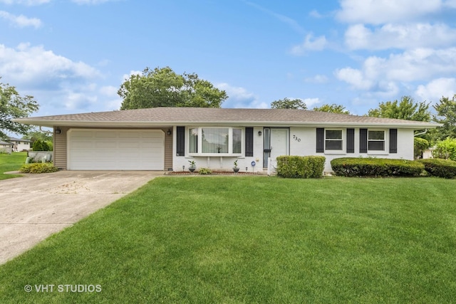 ranch-style house with a garage and a front yard