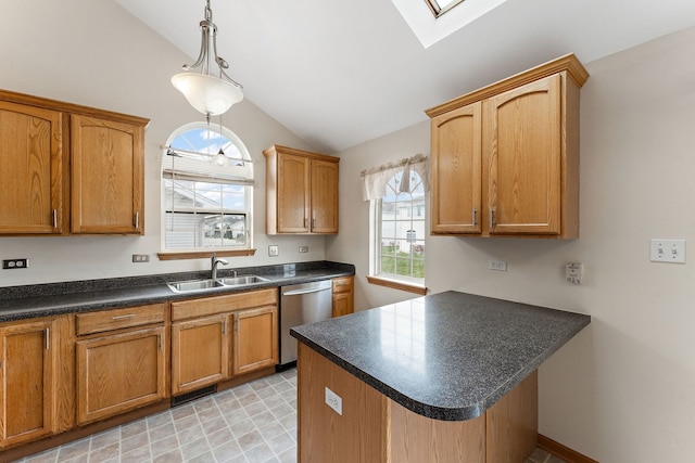 kitchen featuring sink, dishwasher, hanging light fixtures, and vaulted ceiling with skylight