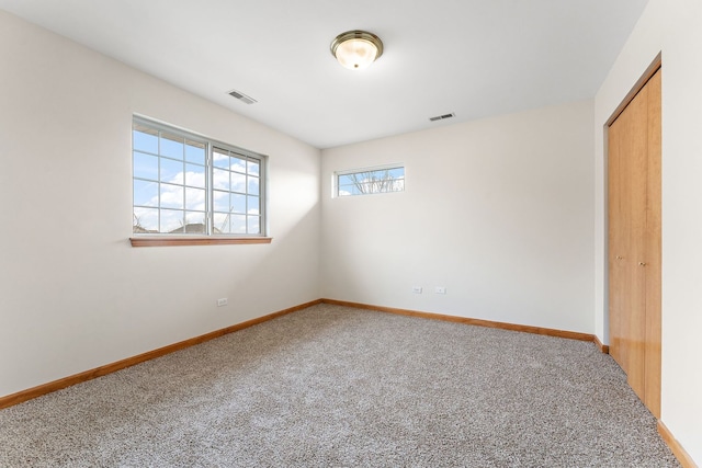 spare room with carpet