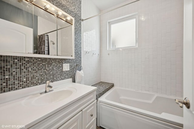 bathroom featuring vanity, tile walls, shower / tub combo, and backsplash