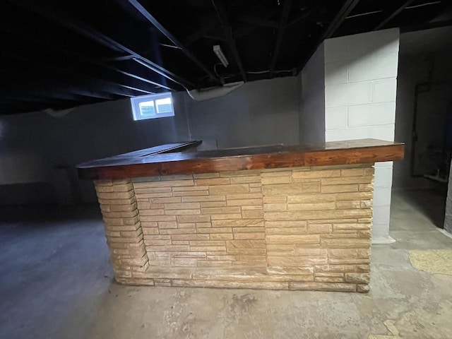 bar with concrete flooring