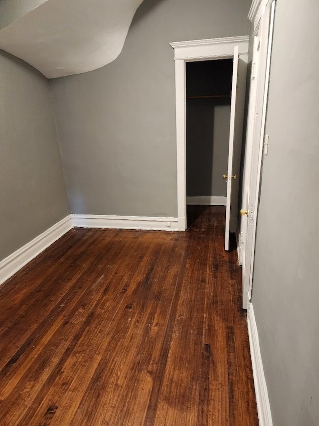 interior space with dark wood-type flooring