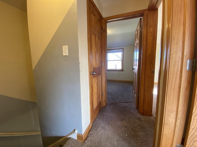 corridor with carpet floors