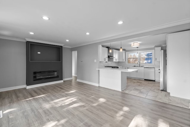 kitchen featuring dishwasher, crown molding, white cabinetry, and sink