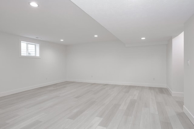 empty room featuring light hardwood / wood-style floors