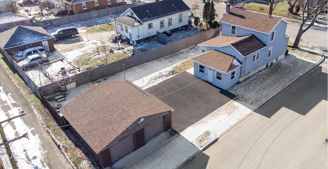 birds eye view of property with a residential view