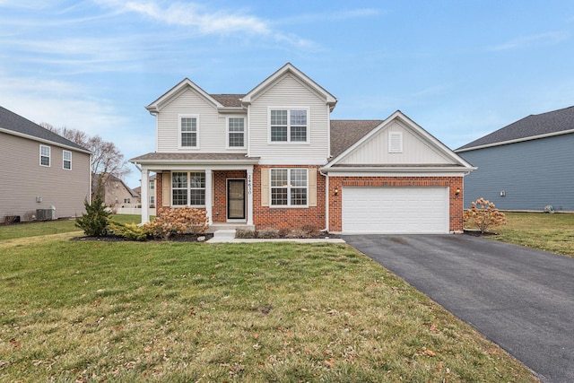 view of front of house featuring central AC, a garage, and a front lawn