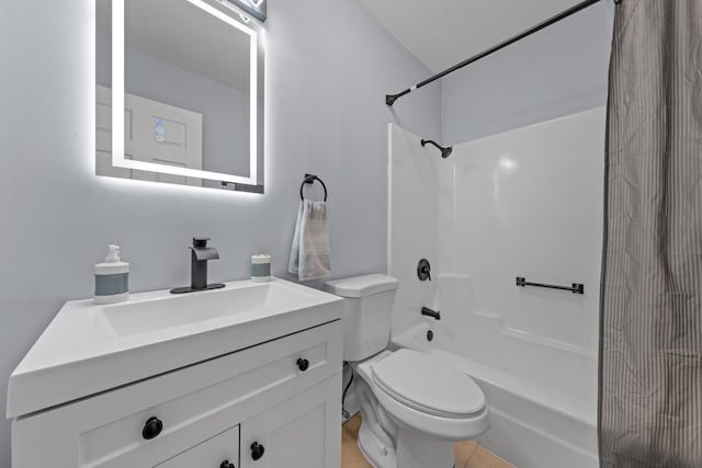 full bathroom featuring tile patterned floors, vanity, toilet, and tub / shower combination