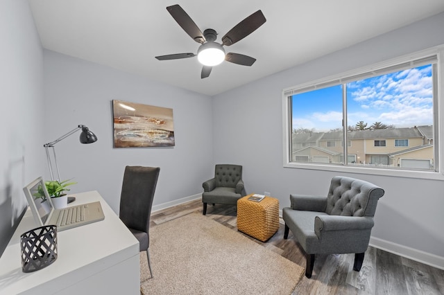 office space featuring ceiling fan and wood-type flooring