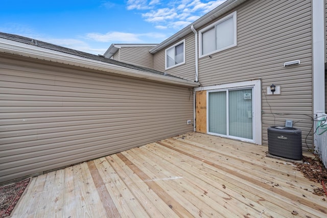 wooden deck with central AC unit