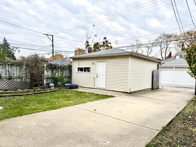 garage featuring a yard