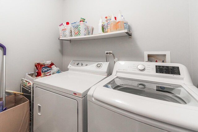 laundry room featuring washer and dryer