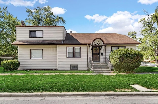 view of front of home with a front lawn