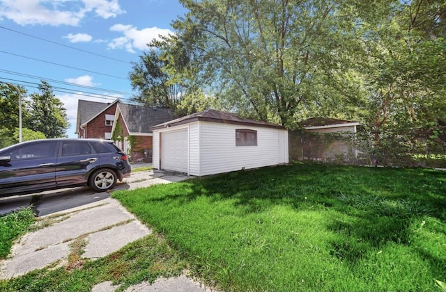 exterior space featuring an outdoor structure and a garage