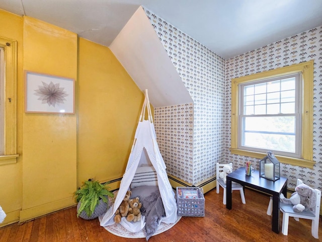 playroom with hardwood / wood-style flooring