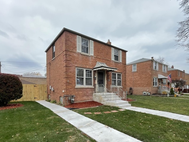 view of front of home featuring a front yard