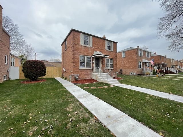 view of front of home featuring a front yard