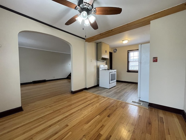 interior space with ceiling fan and light hardwood / wood-style flooring